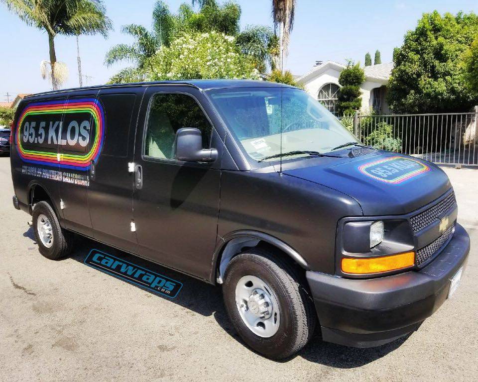 #klos going off the charts with Satin Black Gold Dust & printed Chrome logos, by carwraps.com. #doyou #3m #instadaily #vanwrap #socal #carwrap #instagood #fellers #losangeles #advertising