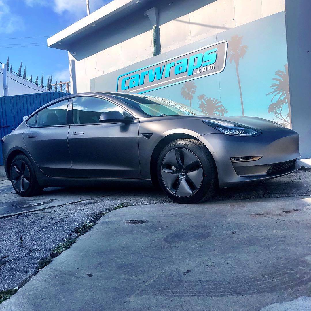 The future is now. #Tesla with 3M-Matte-Dark-Grey.. #doyou #carwraps #socal #vehiclewrap #losangeles #customwrap #carporn #instadaily #instaauto #paintisdead