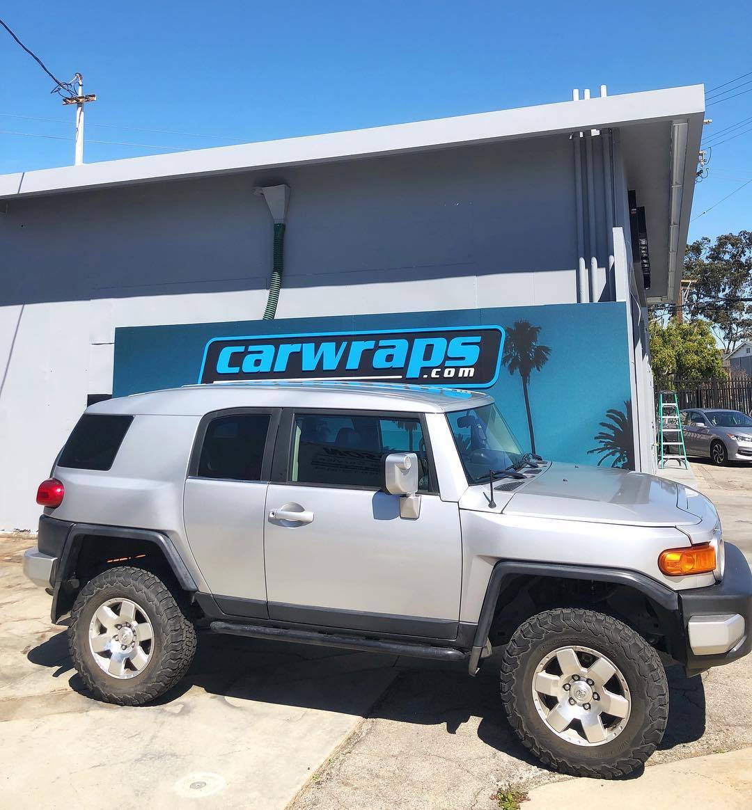 This FJ headed out looking like new again.. 3M Satin White Aluminum. #carwraps #truckwrap #doyou #losangeles #socal #vehiclewrap #fellers #paintisdead